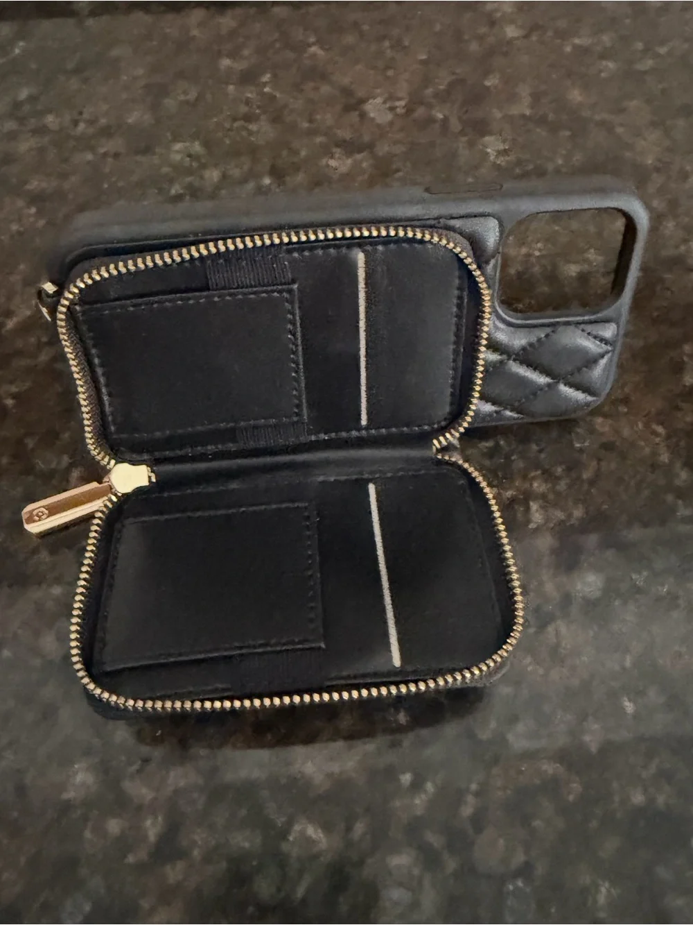Quilted Black Wallet Phone Case with Gold detail.